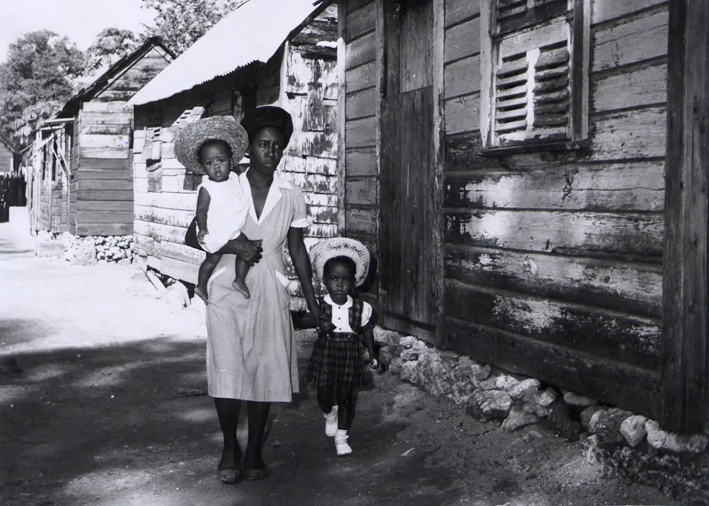 A Barbadian woman and her two children